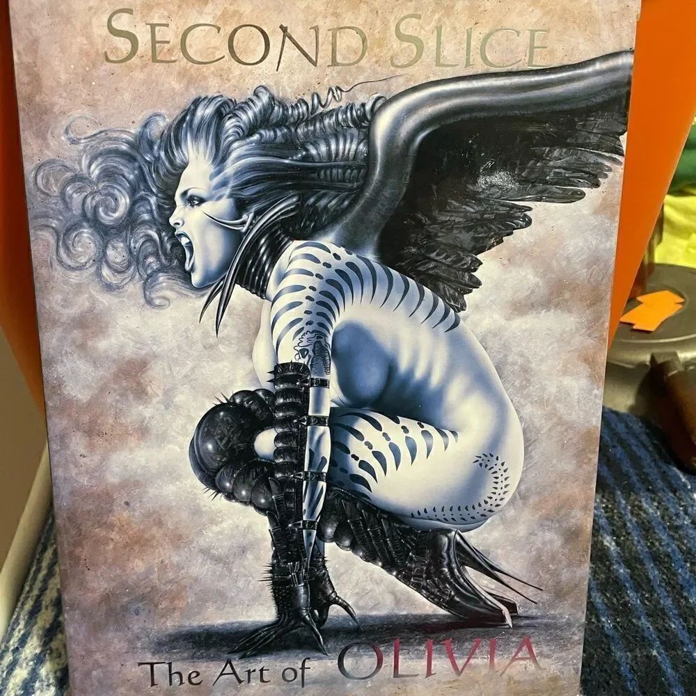Second Slice The Art of Olivia Hardback Book